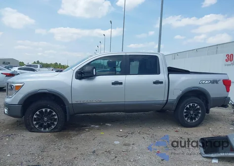 2019 Nissan Titan Pro-4X z USA, uszkodzony, nr VIN 1N6AA1E51KN523784